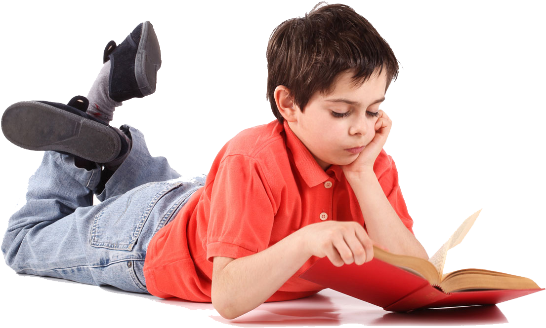 Boy Reading Book While Lying Down