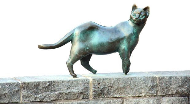 Bronze Cat Sculpture Stone Ledge