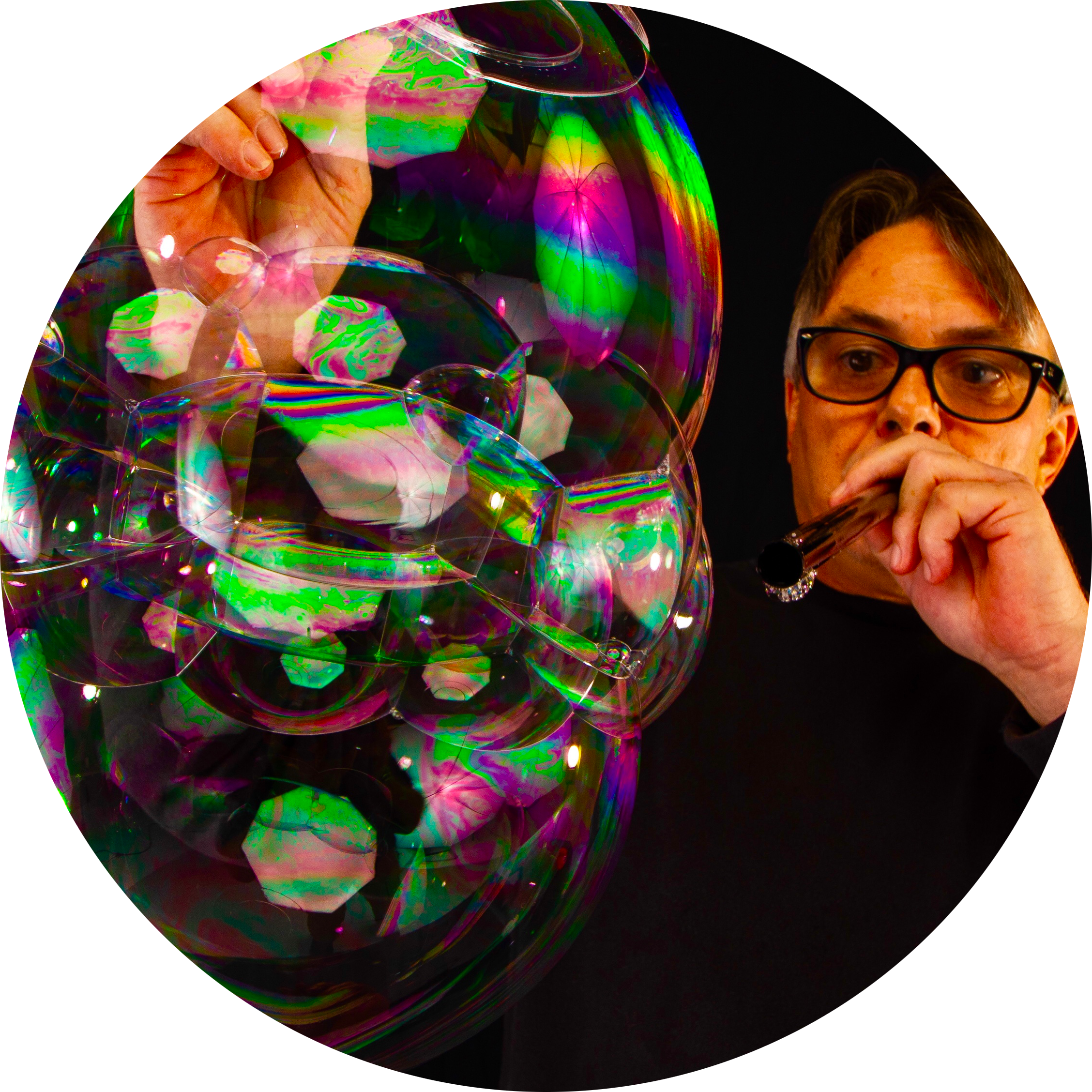 Bubble Blowing Manwith Colorful Soap Bubbles