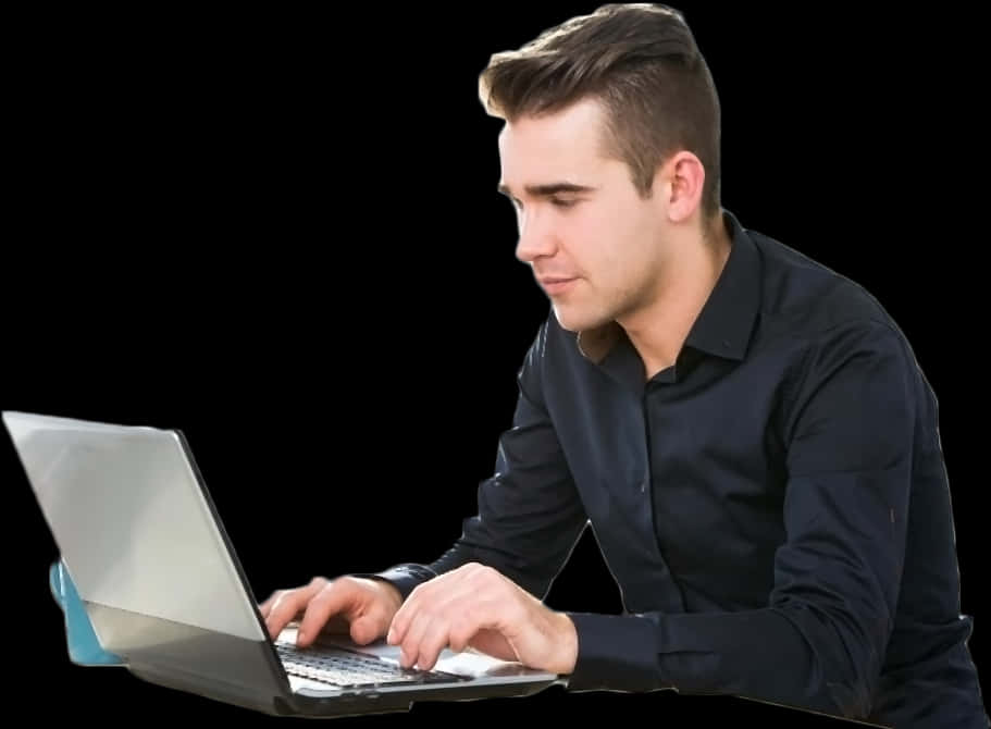 Focused Man Using Laptop