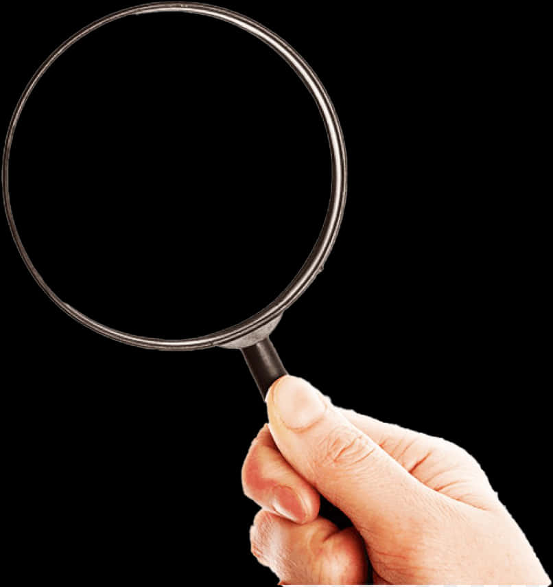 Hand Holding Magnifying Glass