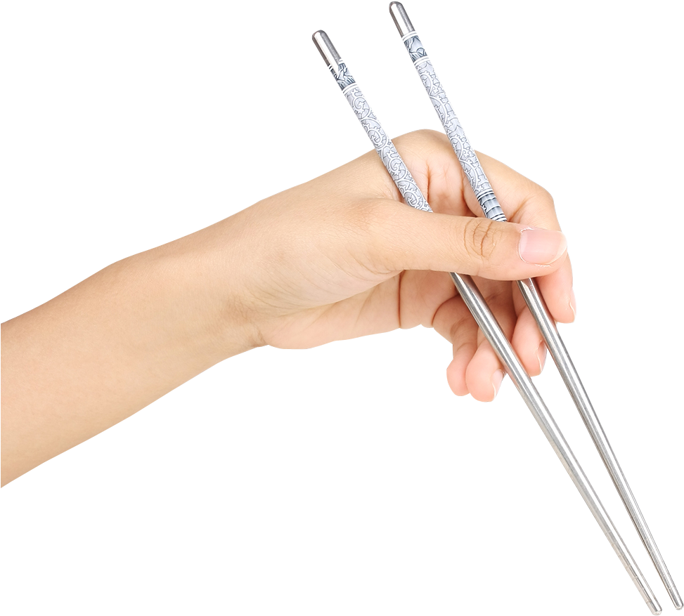 Hand Holding Metal Chopsticks