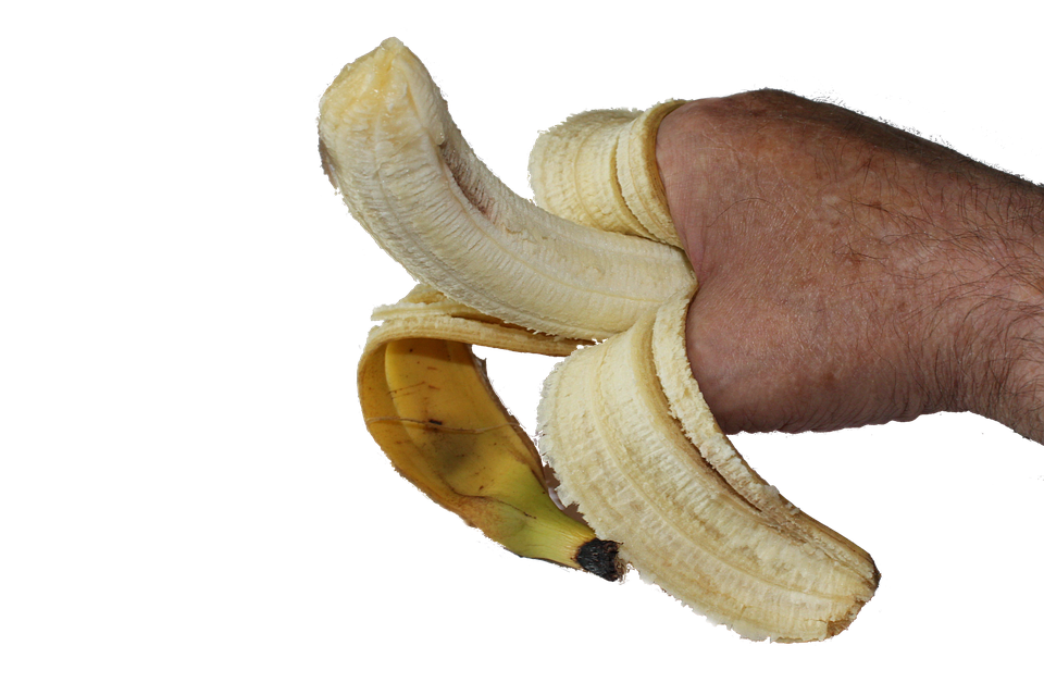 Hand Holding Peeled Banana