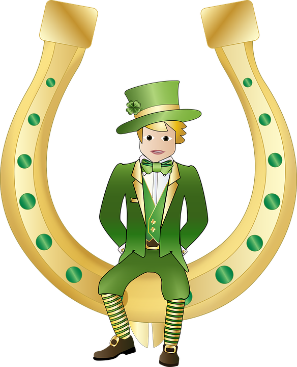 Leprechaun Sitting On Horseshoe St Patricks Day