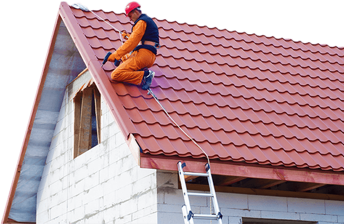 Roofer Installing Tiles On House