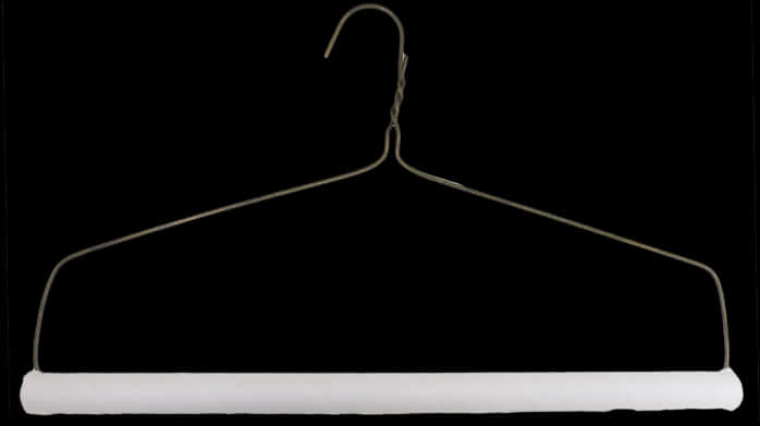 Single White Clothes Hangeron Black Background.jpg