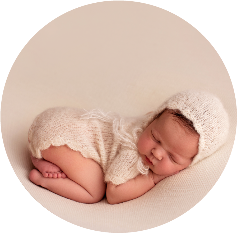 Sleeping Newborn Babyin Knitwear