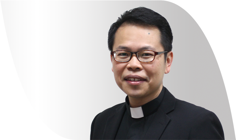 Smiling Catholic Priest Portrait