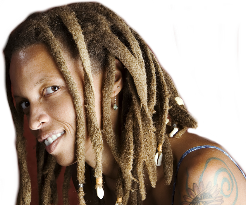 Smiling Personwith Dreadlocksand Tattoo