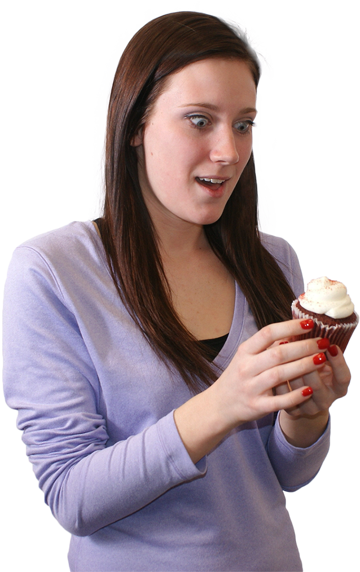 Surprised Woman Holding Cupcake