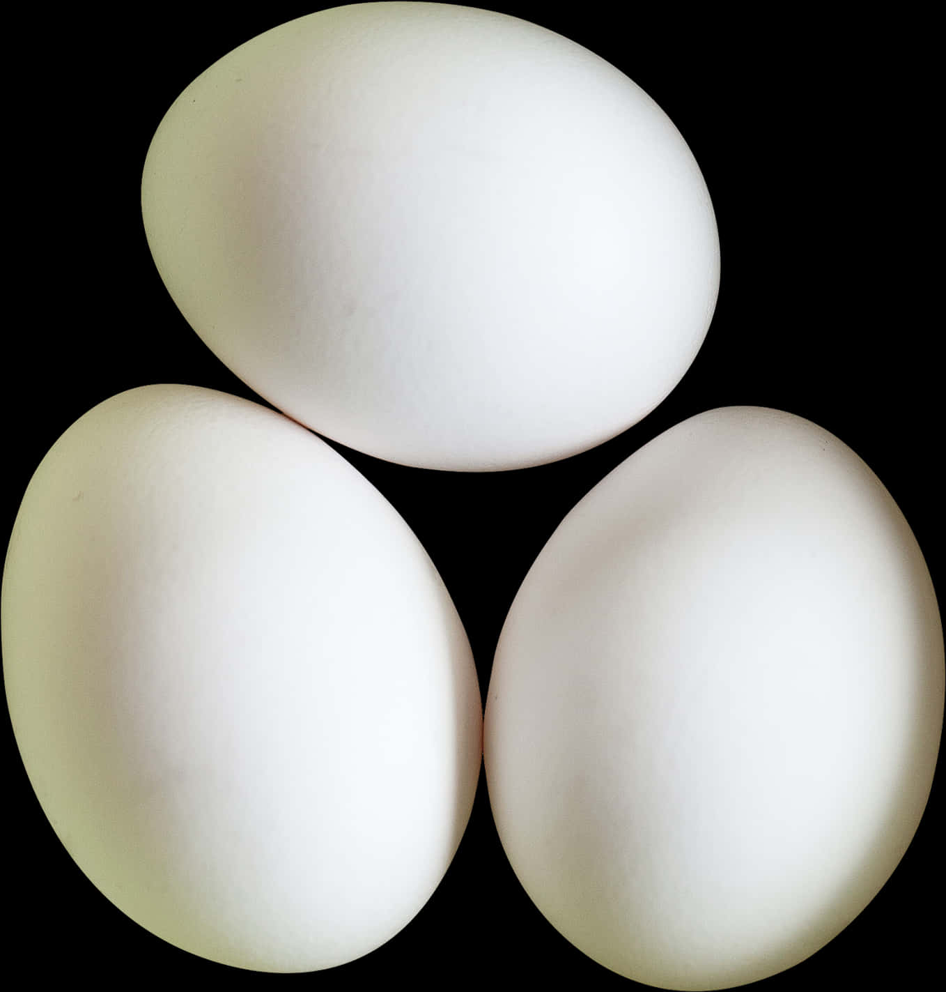 Three White Eggs Black Background