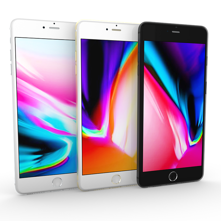 Threei Phone Models Displaying Colorful Wallpapers