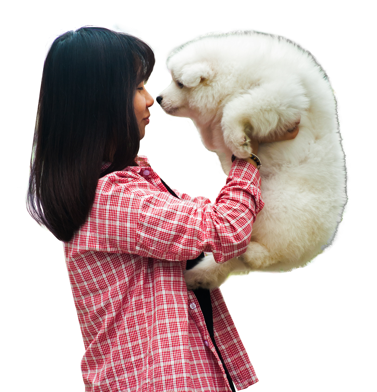 Woman Holding Fluffy White Dog