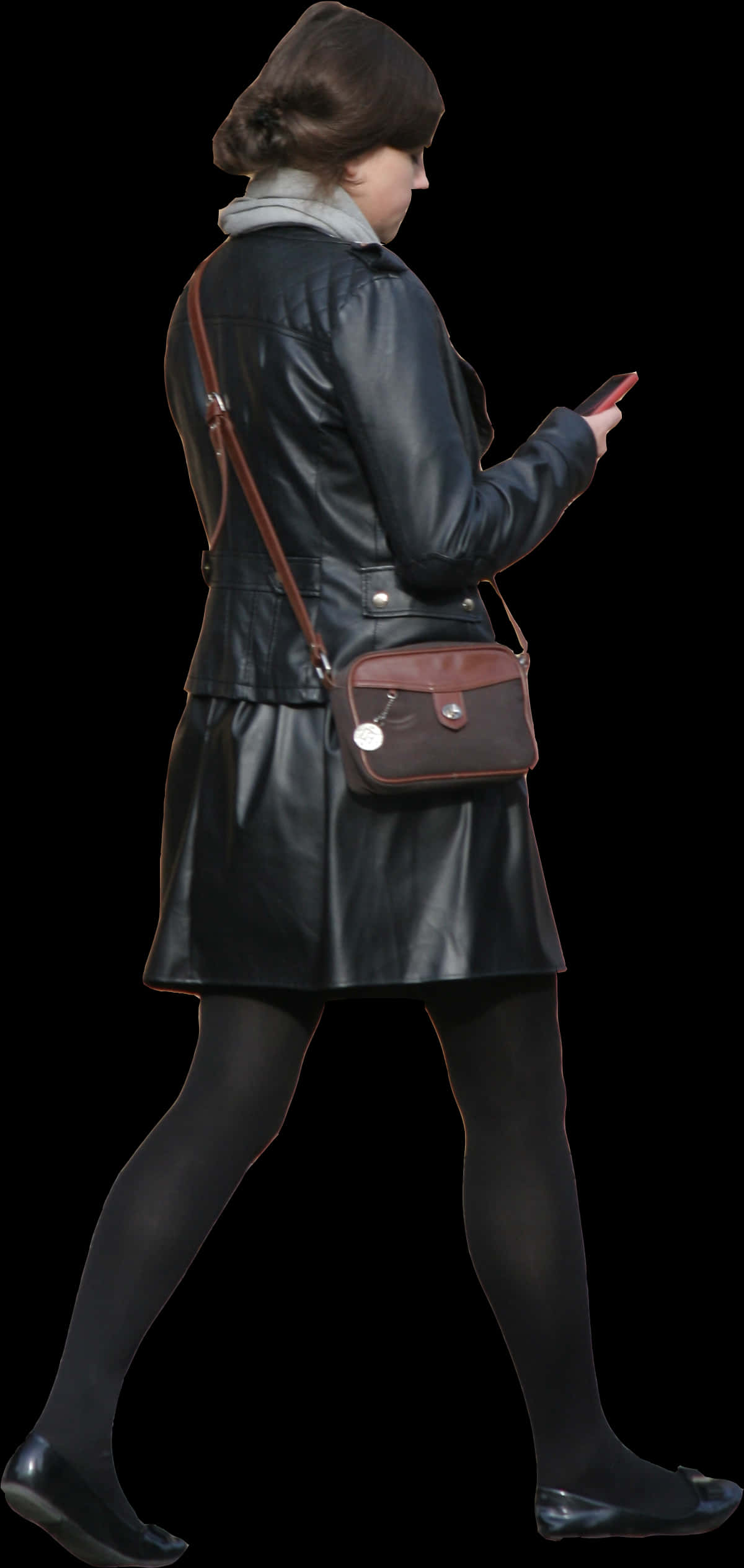 Womanin Leather Coat Walkingand Texting