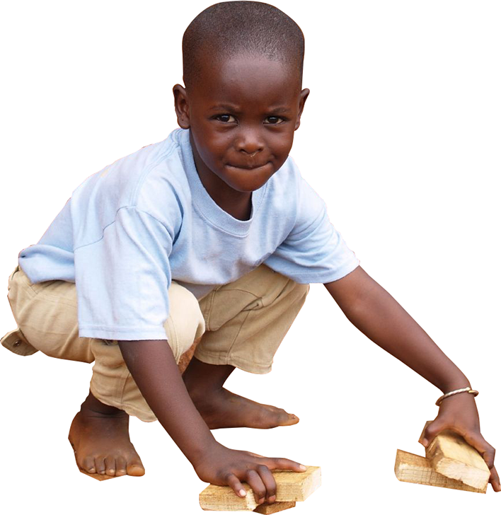 Young Boy Playing With Wooden Blocks