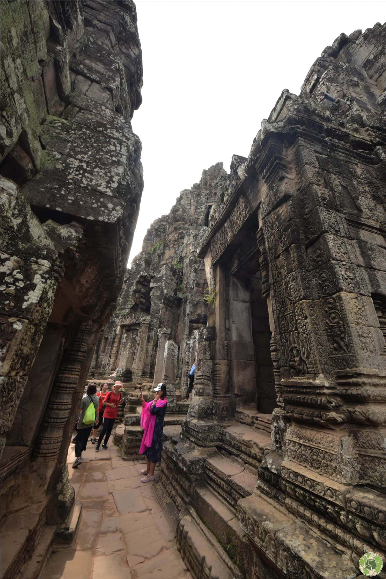 Ancient_ Temple_ Corridor_with_ Visitors.jpg PNG Image