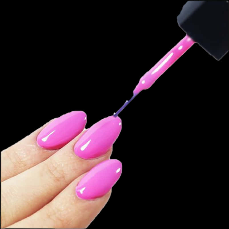 Applying Pink Nail Polish PNG Image