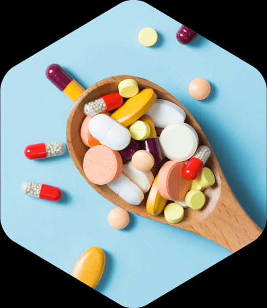 Assorted Medicationsin Wooden Spoon PNG Image