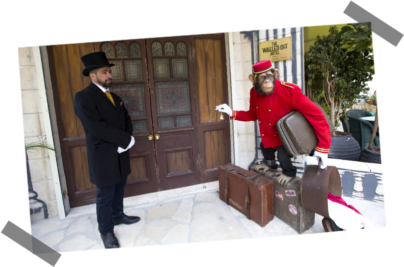 Banksy Walled Off Hotel Bellhop Monkey PNG Image