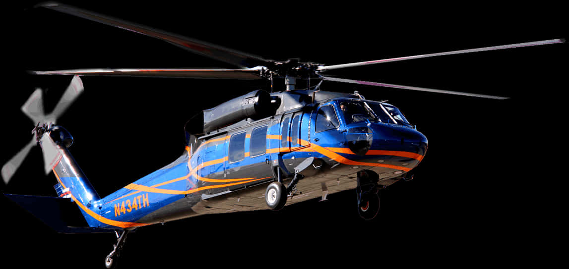 Blueand Orange Helicopterin Flight PNG Image