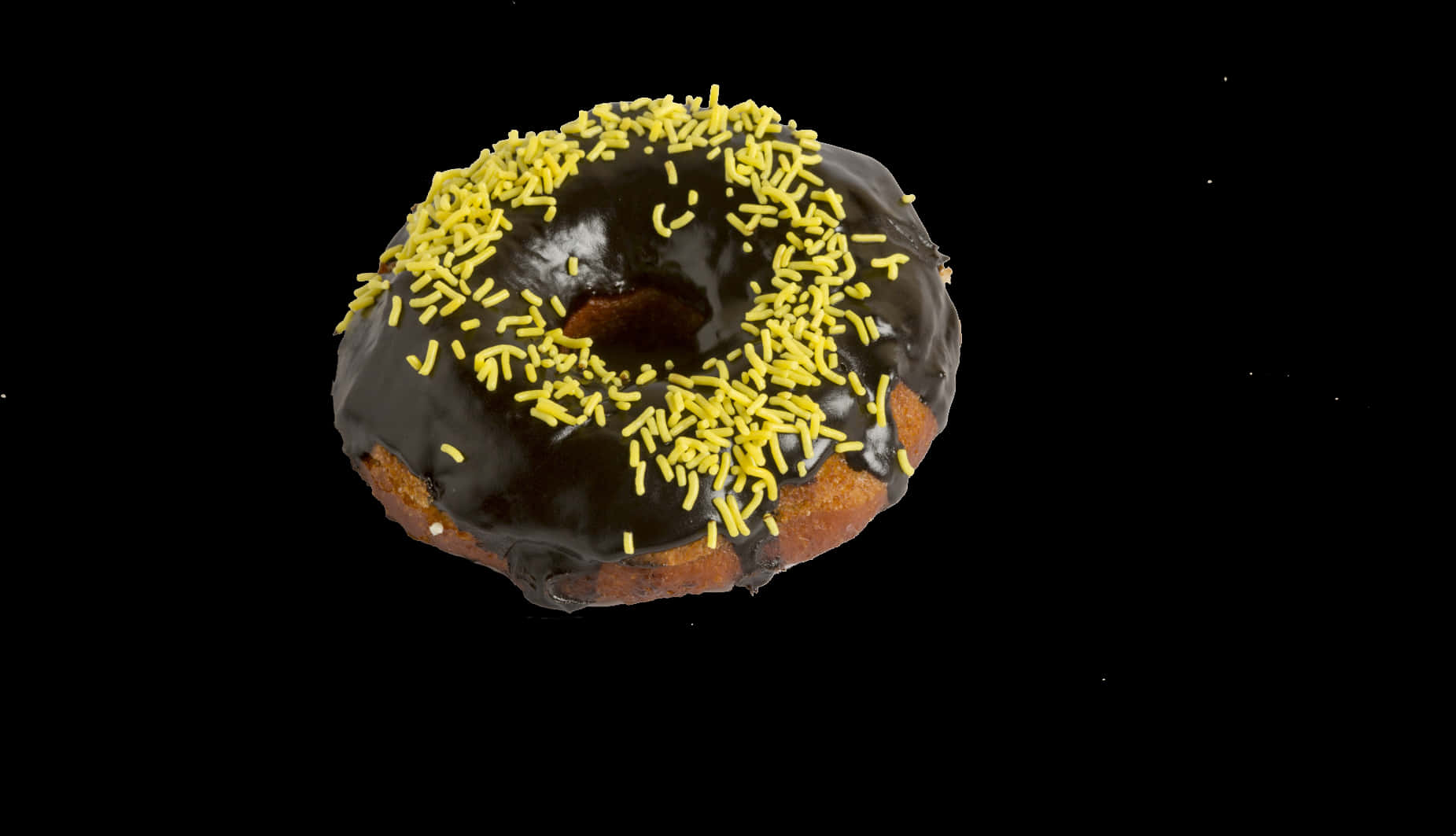 Chocolate Sprinkled Donut Black Background.jpg PNG Image