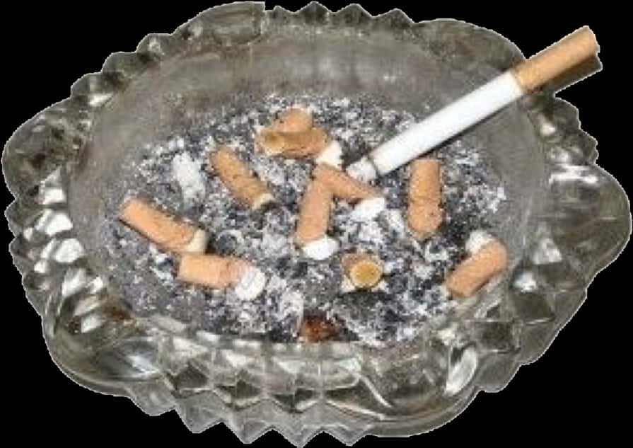 Cigarette Buttsin Ashtray.jpg PNG Image