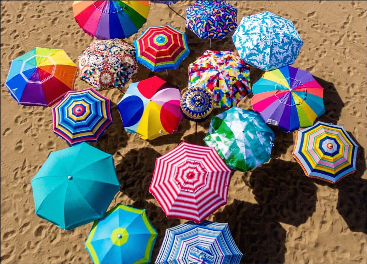 Colorful Beach Umbrellas Aerial View PNG Image