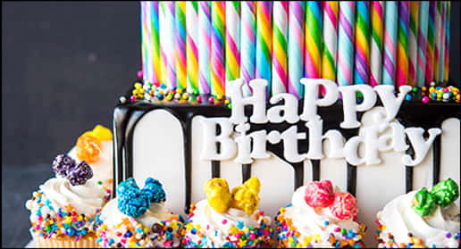 Colorful Birthday Cakewith Cupcakesand Candles PNG Image