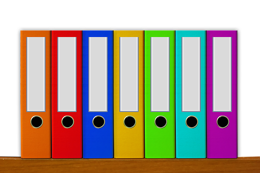 Colorful Office Binderson Shelf PNG Image