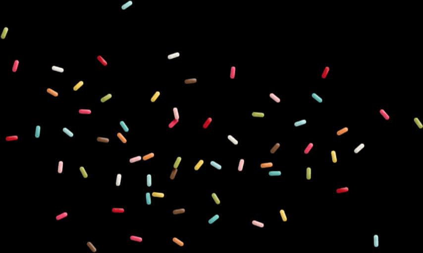 Colorful Sprinkleson Black Background PNG Image