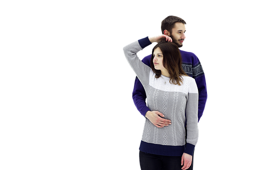 Couplein Sweaters Posing PNG Image