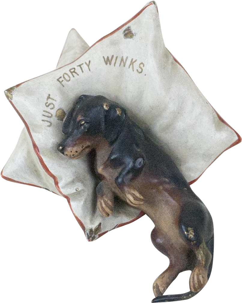 Dachshund Restingon Pillow Figurine PNG Image