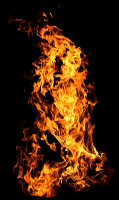 Dancing Flames Against Darkness PNG Image