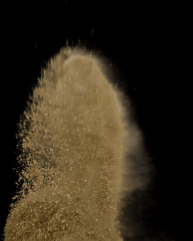 Dynamic Sand Explosion PNG Image