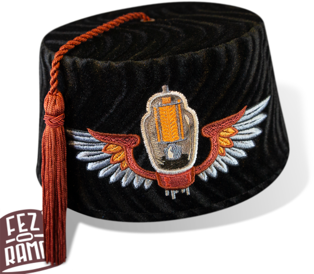 Embroidered Fez Hatwith Winged Emblem PNG Image