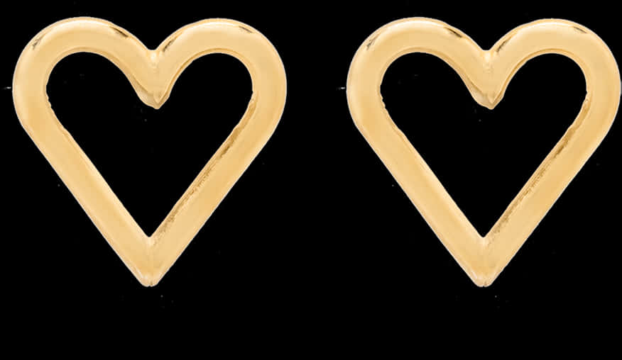 Golden Heart Outlineson Black PNG Image