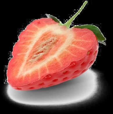 Half Cut Strawberryon Black Background.jpg PNG Image