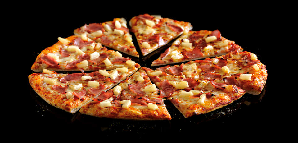 Hawaiian Pizza Sliced Black Background PNG Image