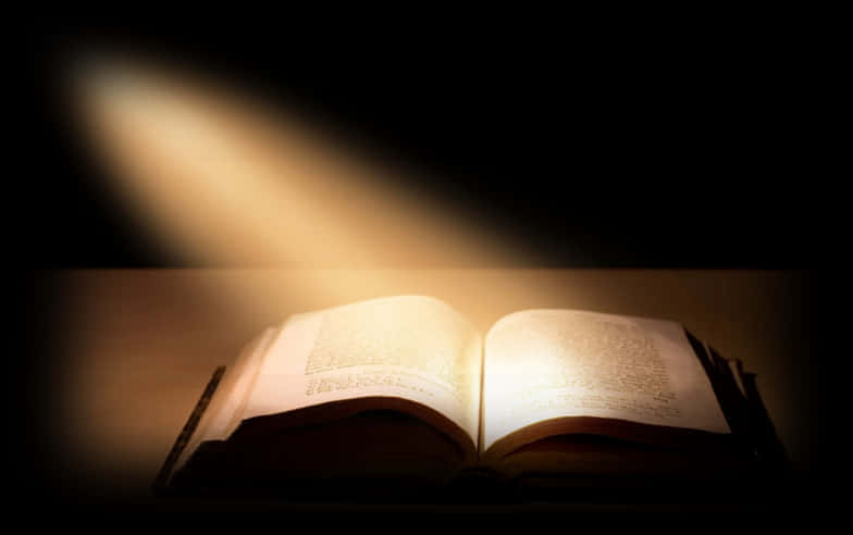 Holy Bible Illuminatedby Light Beam PNG Image