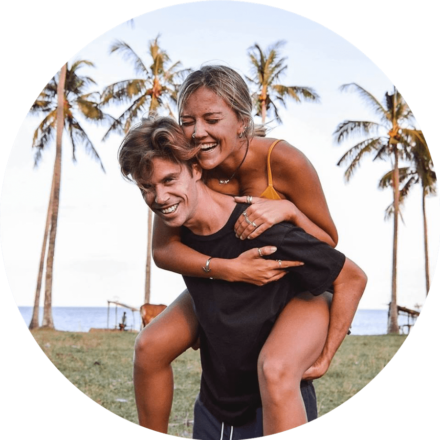 Joyful Beachside Piggyback Ride PNG Image