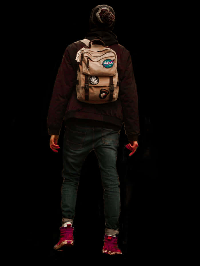 Man With Backpack Standing Against Black Background PNG Image