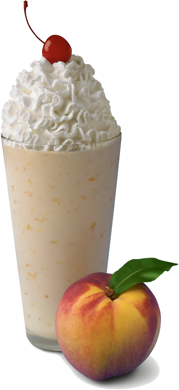 Peach Milkshake With Whipped Creamand Cherry PNG Image