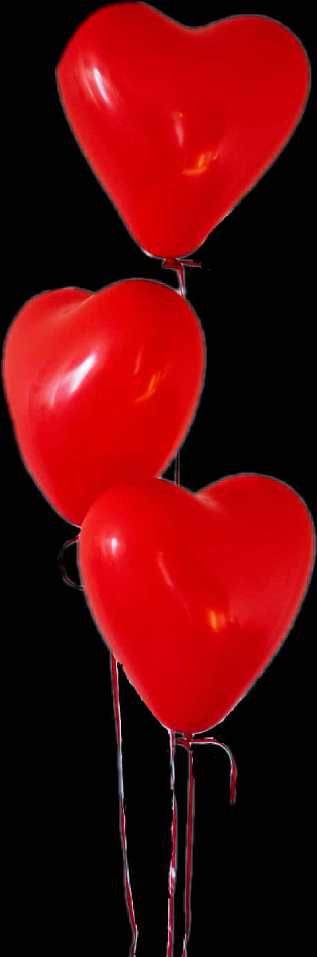 Red Heart Shaped Balloonson Black Background PNG Image