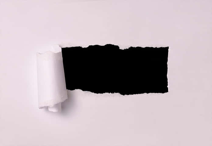 Ripped Paper Revealing Black Background.jpg PNG Image