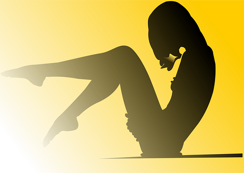 Silhouetteof Seated Woman PNG Image