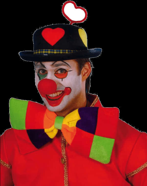 Smiling Clownwith Red Noseand Colorful Attire PNG Image