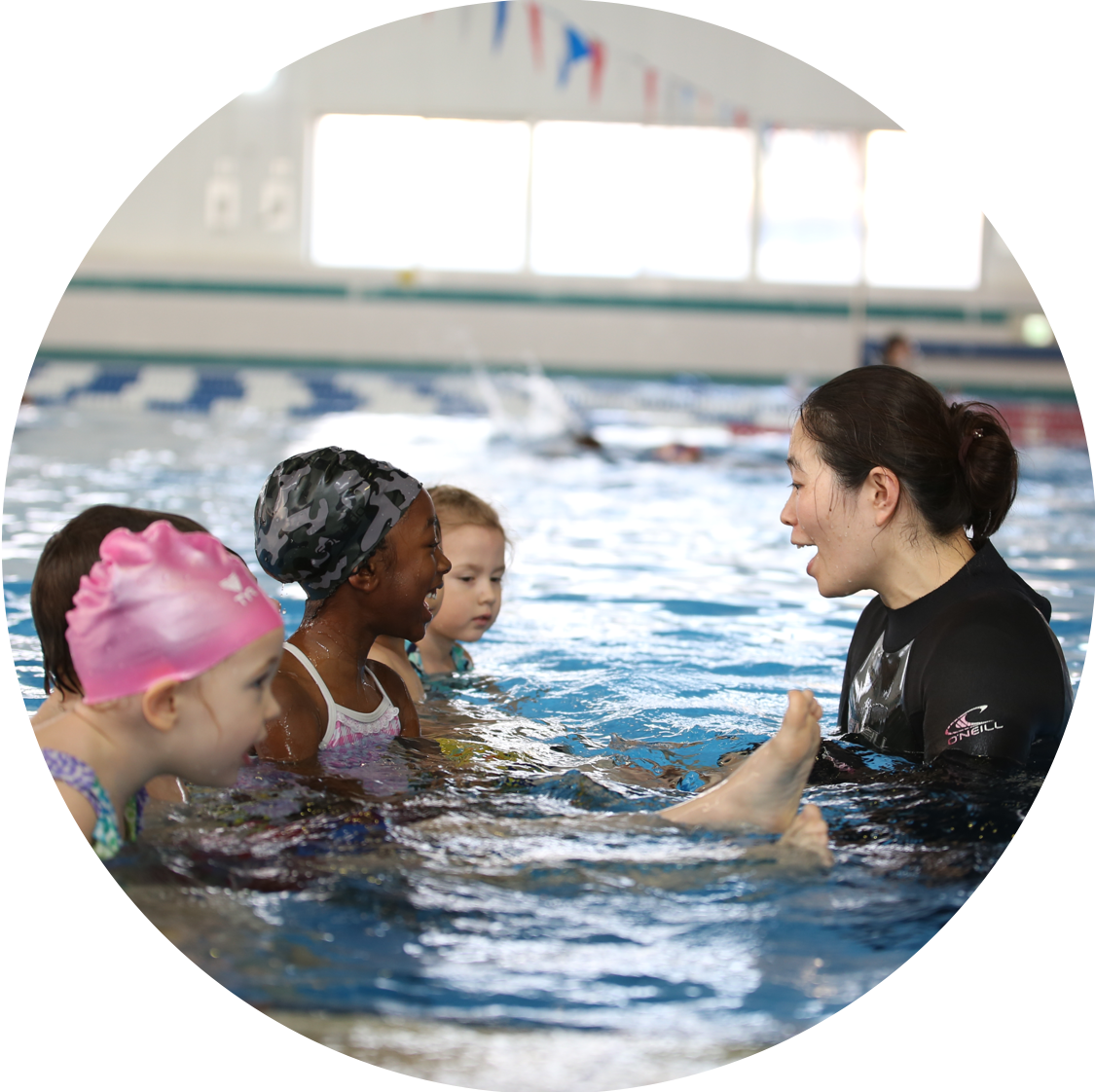 Swimming_ Lesson_ Instructor_with_ Children.png PNG Image