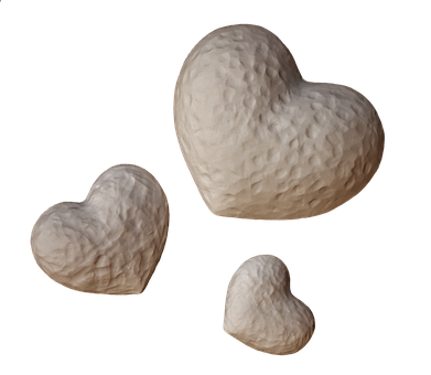 Three Heart Stoneson Black Background PNG Image