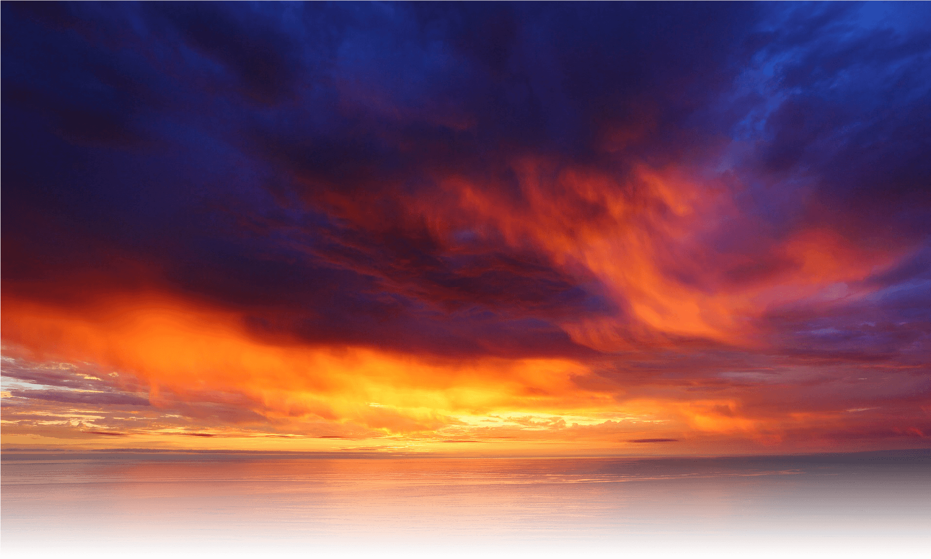 Vivid_ Sunset_ Over_ Ocean PNG Image