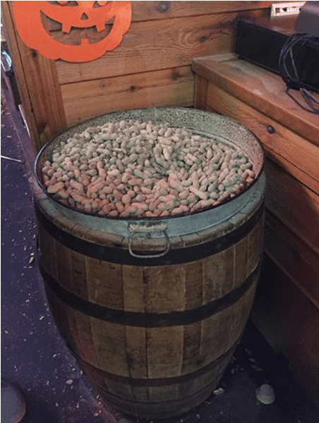 Whiskey Barrel Fullof Peanuts Halloween Decor PNG Image